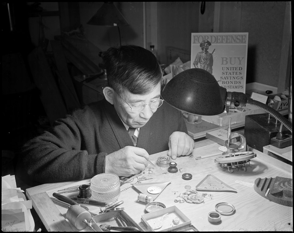Minidoka Relocation Center. Sokichi Hoshide. Watch repair shop. - NARA - 536567