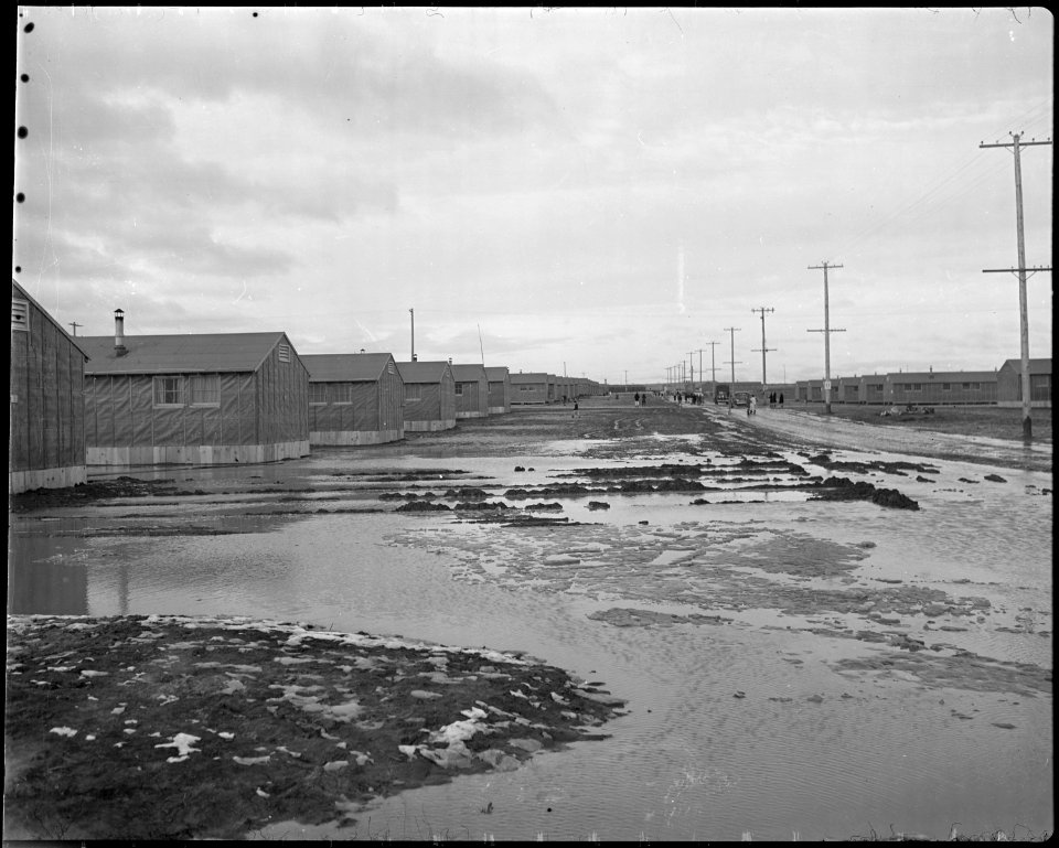 Minidoka Relocation Center. Mud from rain and melting snow - NARA - 536602