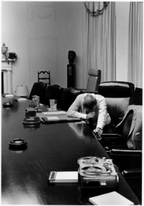 Moods, President Lyndon B. Johnson listens to tape sent by Captain Charles Robb from Vietnam - NARA - 192617