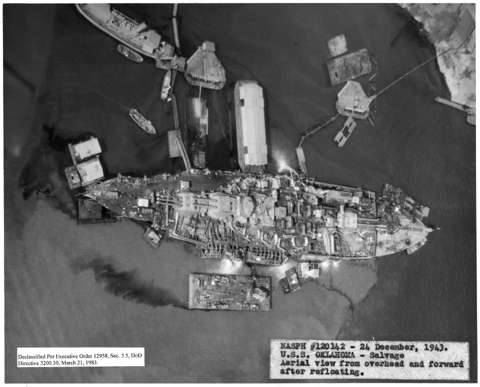 NASPH ^120142- 24 December 1943, USS Oklahoma- Salvage, Aerial view from overhead and forward after refloating - NARA - 296971