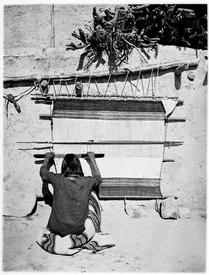 Navaho woman weaving at loom - NARA - 523806