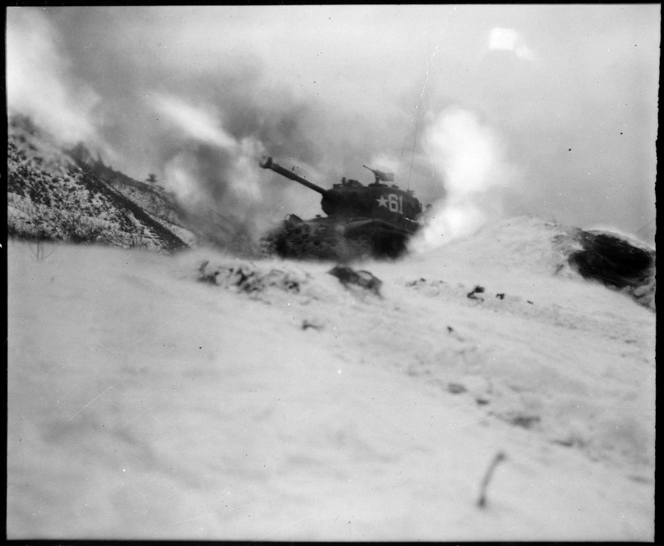Near Song Sil-li, Korea, a tank of 6th Tank Battalion, fires on enemy positions in support of the 19th Regimental... - NARA - 531423