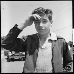 Oakland, California. Hitch-hiking. Typical teenage hitch-hiker within the city limits - NARA - 532093