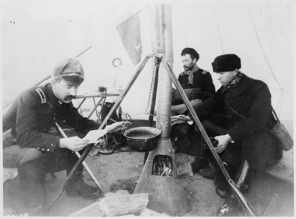 Officers in tent by fire during the Pine Ridge campaign, 1890-91 - NARA - 531127