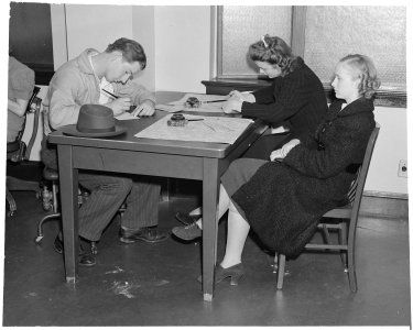 Oakland, California. Junior Employment Service. Filling out applications. The girls want part time work in domestic... - NARA - 532230 photo