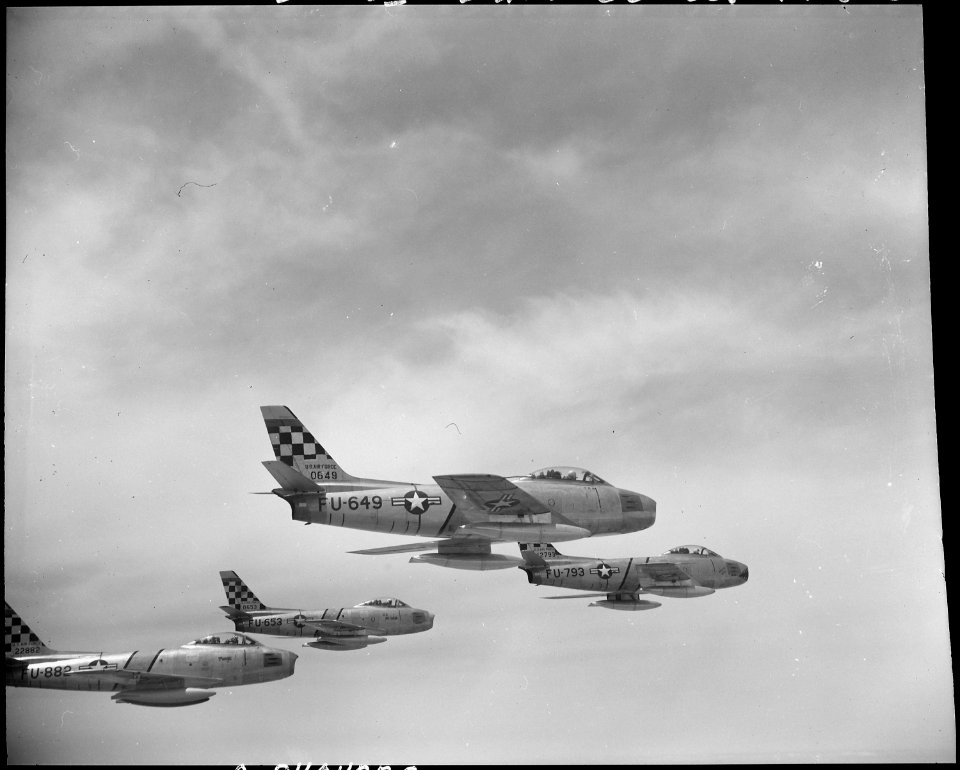 OVER NORTHWEST KOREA - Sleek U.S. Air Force F-86 Sabre jets of the 51st Fighter Interceptor Wing form this... - NARA - 542186