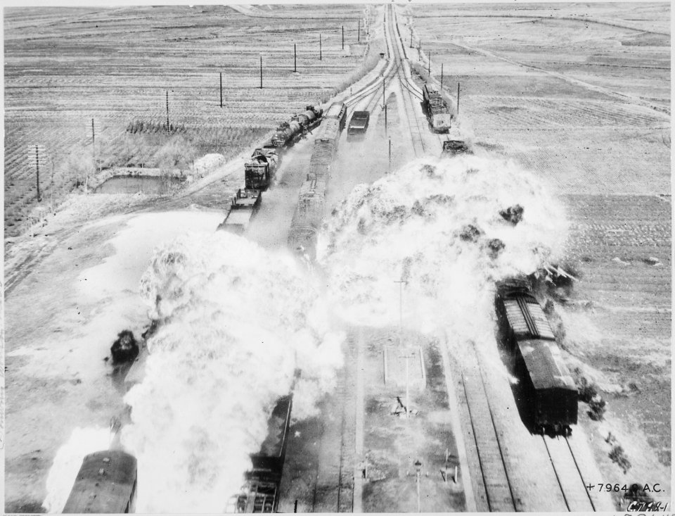 Over North Korea-Bombardiers in B-26s of the Fifth Air Force's 452 Light Bomb Wing used the  Y in the tracks as an... - NARA - 542225