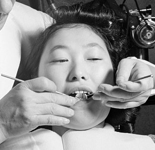 Patient face detail, Heart Mountain Relocation Center, Heart Mountain, Wyoming. Doctor H. Nakahara, head of the dental c . . . - NARA - 539466 (cropped)