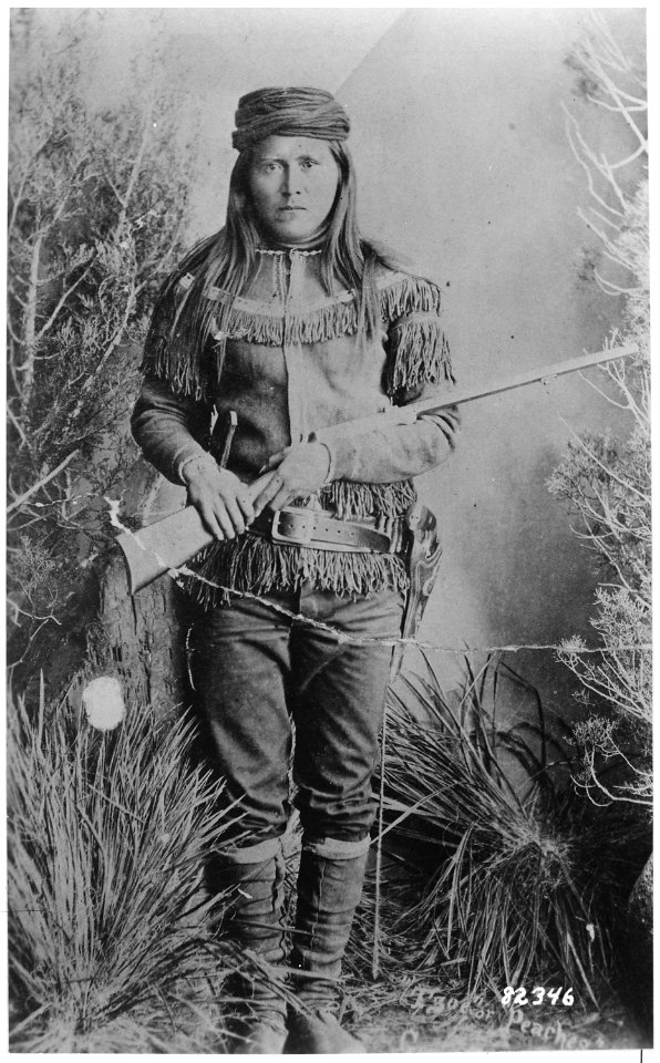 Peaches (Tsoe), a White Mountain Apache scout, full-length, holding rifle, 1885 - NARA - 530799