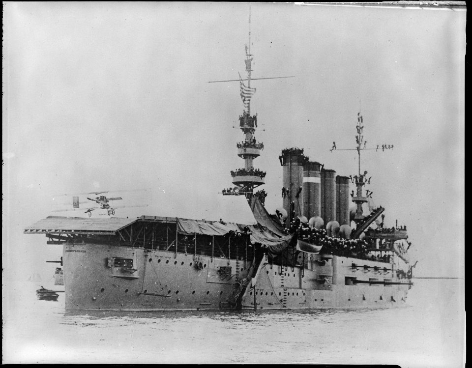 Pennsylvania (Armored Cruiser 4), starboard stern quarter with Eugene P. Ely landing plane on flight deck, 01-18-1911 - NARA - 520791