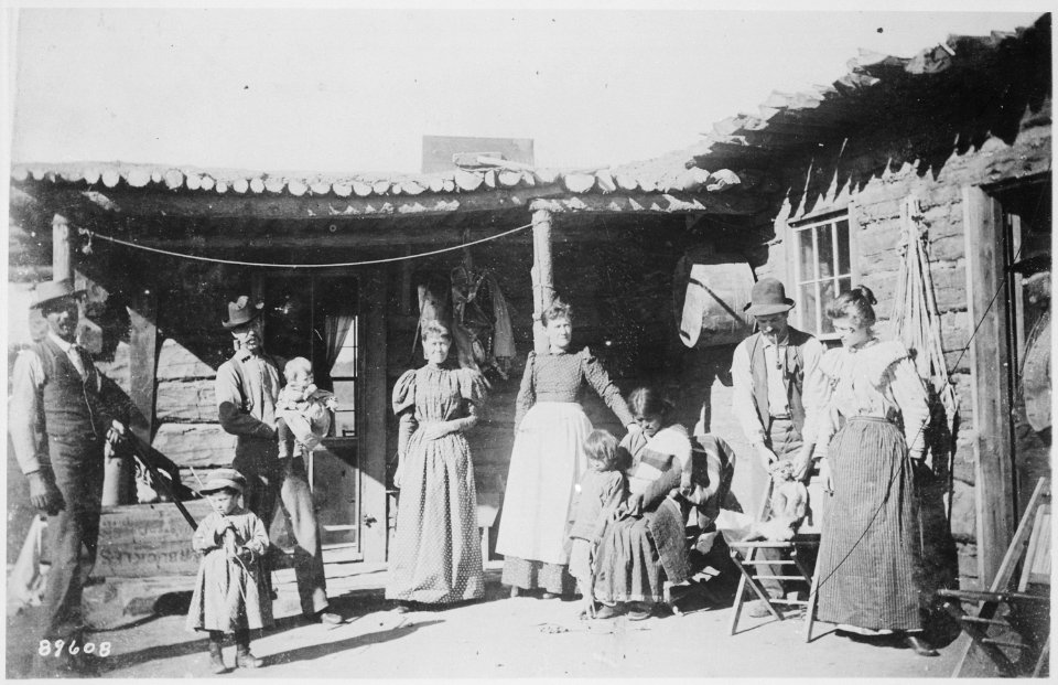 Photograph of a Family Group Outside a Log Cabin in New Mexico, ca. 1895 - NARA - 530947