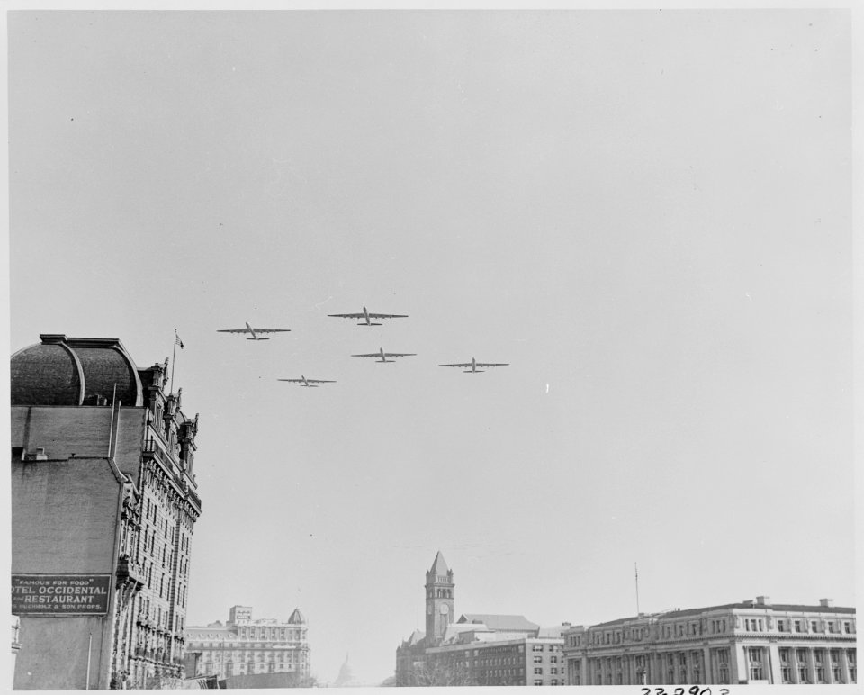 Photograph of a formation of airplanes, B-36 bombers, flying over Washington during the Inaugural festivities for... - NARA - 200062
