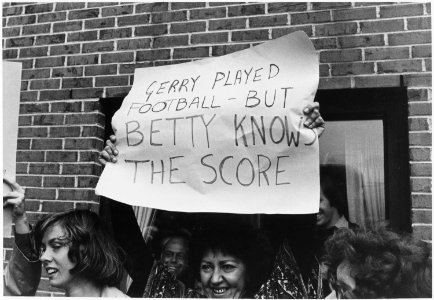 Photograph of a Woman Holding a Sign in Portland Maine, Supporting First Lady Betty Ford For Her Stance on Various... - NARA - 186817 photo