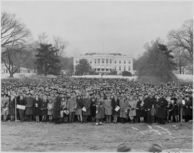 Photograph of a large crowd of spectators assembled on the White House Grounds for the ceremonial lighting of the... - NARA - 199281