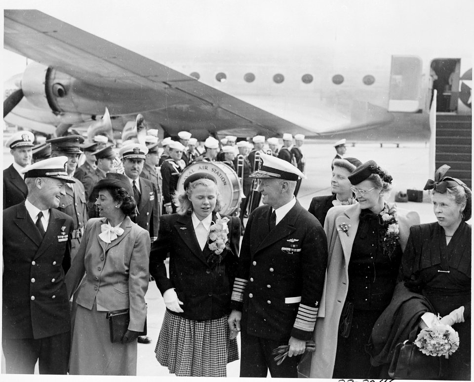 Photograph of Admiral Chester Nimitz and his family at the airport in Washington. - NARA - 199200