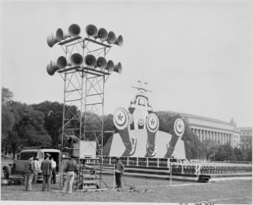 Photograph of battleship mock-up set up as a backdrop for ceremonies in Washington honoring Admiral Chester Nimitz. - NARA - 199208