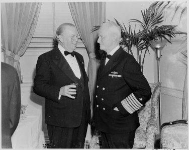 Photograph of actor Charles Coburn with Admiral Chester Nimitz at a Roosevelt Birthday Ball function in Washington. - NARA - 199323