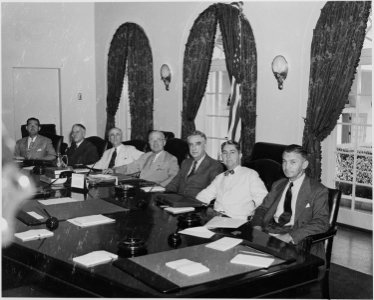 Photograph of Cabinet members with President Truman, (from left to right) Postmaster General Robert Hannegan... - NARA - 199139