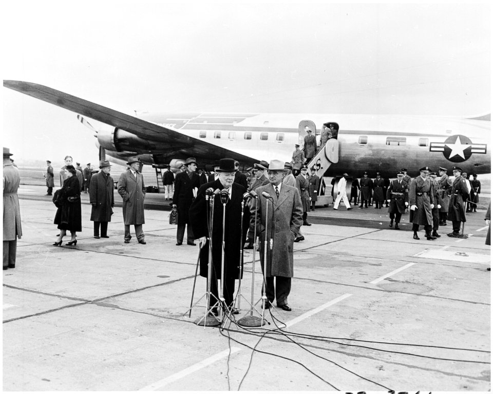 Photograph of British Prime Minister Winston Churchill making brief remarks at Washington National Airport, upon his... - NARA - 200348