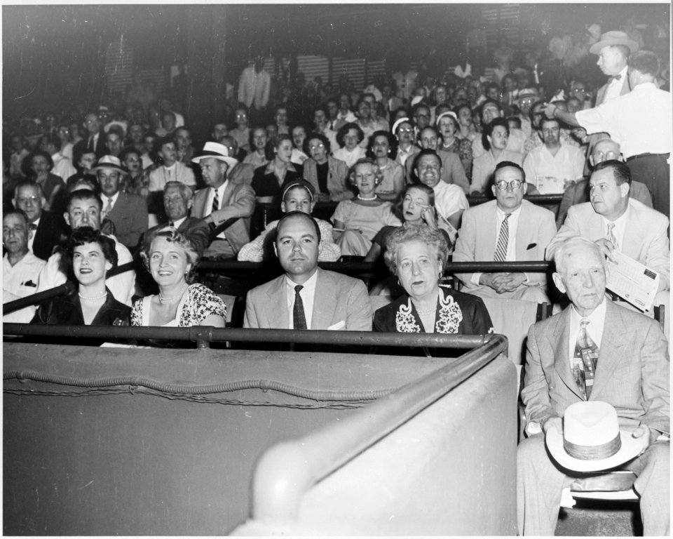 Photograph of Bess Truman and Margaret Truman at a baseball game, probably in Washington, with Margaret's friend... - NARA - 200440