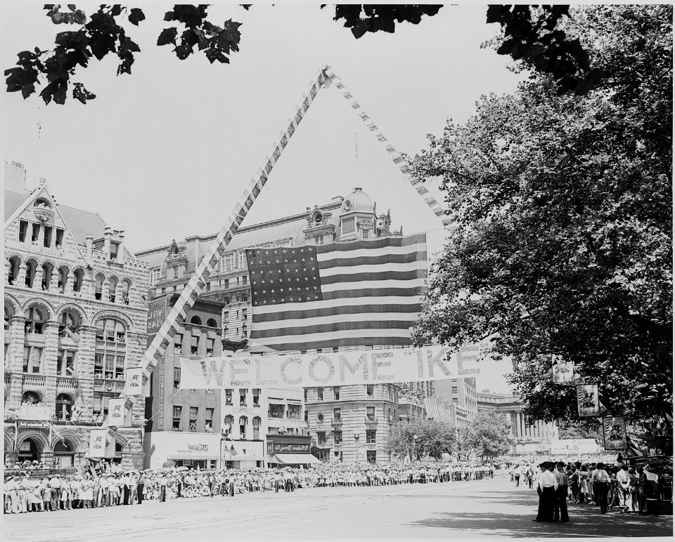 Photograph of crowds gathered along a Washington street to welcome General Dwight D. Eisenhower to the nation's... - NARA - 199109