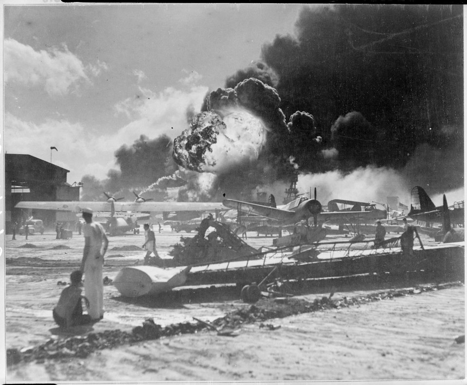 Pearl Harbor, taken by surprise, during the Japanese aerial attack. Wreckage at Naval Air Station, Pearl Harbor. - NARA - 520595