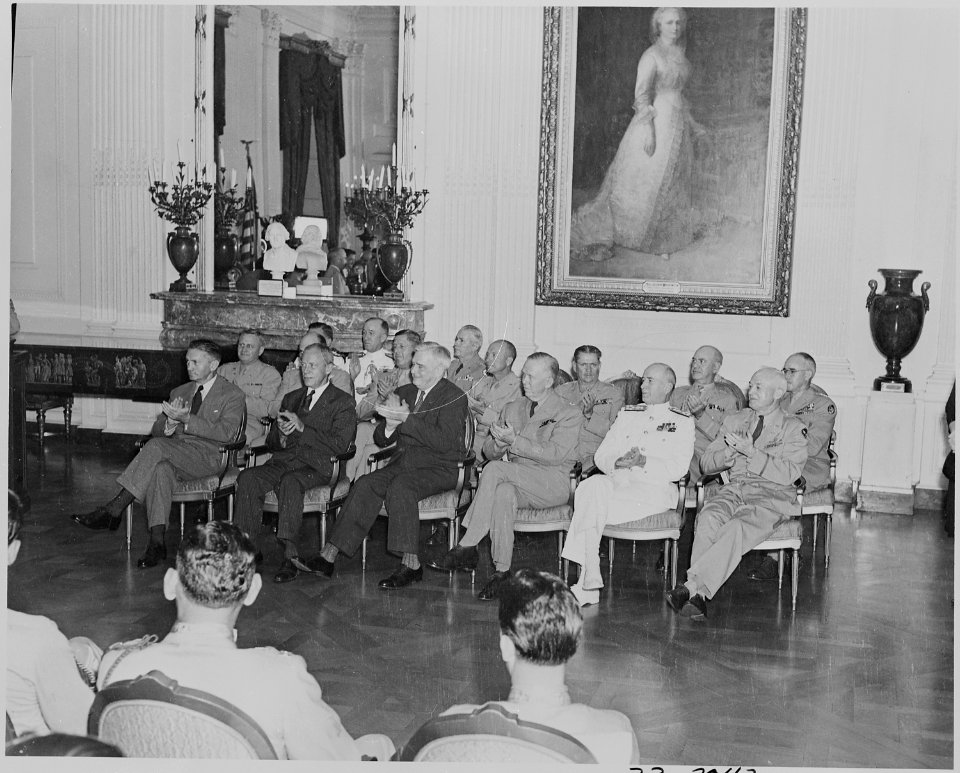 Photograph of dignitaries applauding during Medal of Honor presentation ceremony in the East Room of the White House... - NARA - 199197