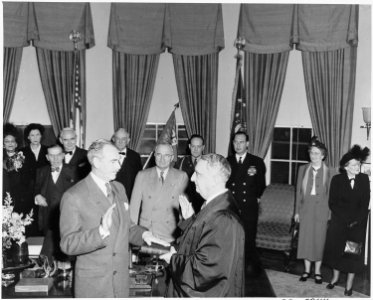 Photograph of Dean Acheson being sworn in as Secretary of State by Chief Justice Fred Vinson, as President Truman and... - NARA - 200074