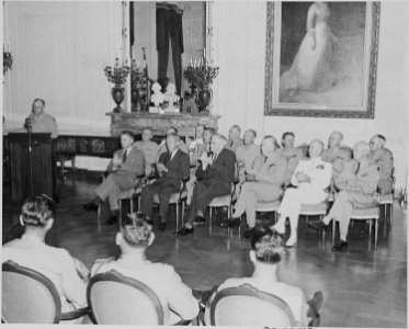 Photograph of dignitaries applauding during Medal of Honor presentation ceremony in the East Room of the White House... - NARA - 199196