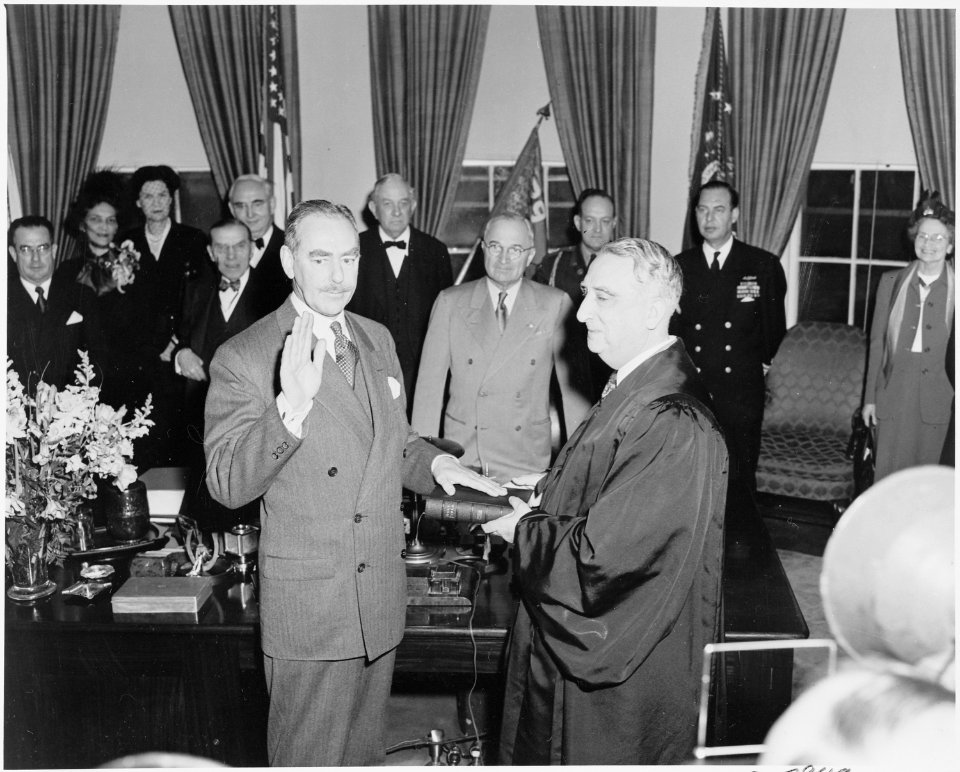Photograph of Dean Acheson taking the oath of office as Secretary of State, with Chief Justice Fred Vinson... - NARA - 200077