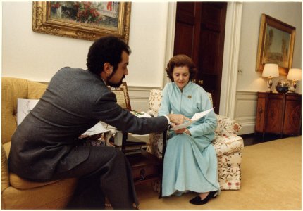 Photograph of First Lady Betty Ford Meeting with Fashion Designer Albert Capraro in the Second Floor West Sitting... - NARA - 186788 photo