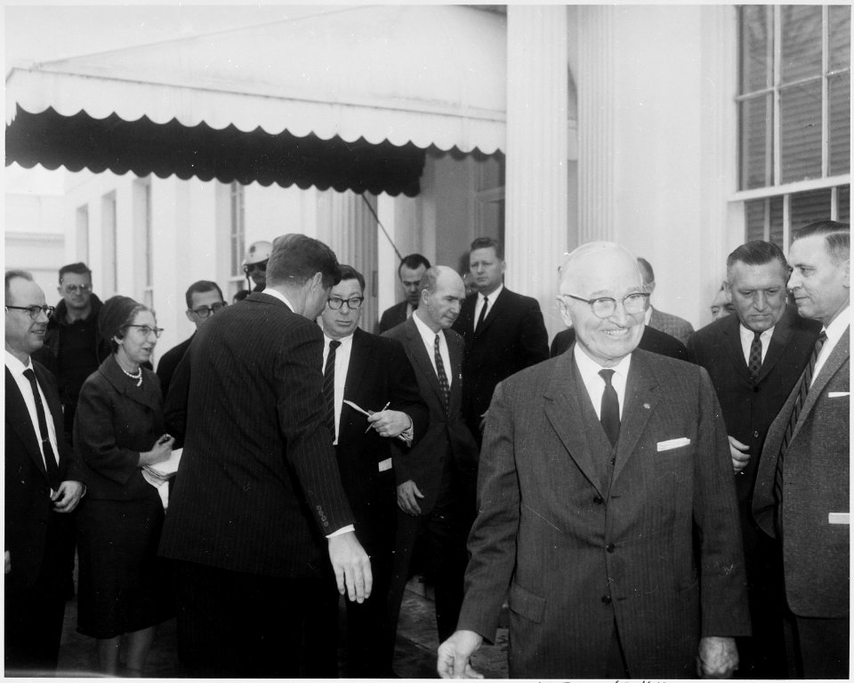 Photograph of former President Harry S. Truman smiling during his visit to the White House, as President John F.... - NARA - 200432
