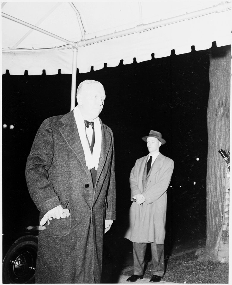 Photograph of former Secretary of State George C. Marshall arriving at Blair House in Washington for a dinner in... - NARA - 200111