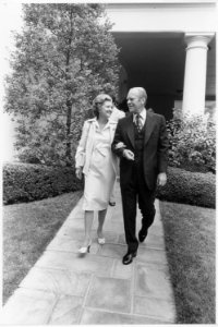 Photograph of First Lady Betty Ford Escorting the President Gerald Ford to his Limousine Before Heading to a Surprise... - NARA - 186834 photo