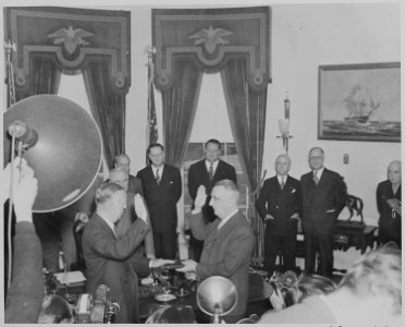 Photograph of George C. Marshall being sworn in as Secretary of State by Chief Justice Fred Vinson in the Oval... - NARA - 199521