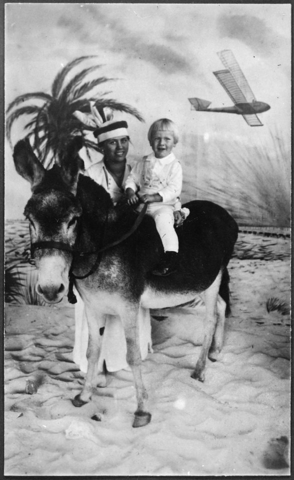 Photograph of Gerald R. Ford, Jr., (Then Leslie Lynch King, Jr.) Sitting on a Donkey while his Mother, Dorothy... - NARA - 186900