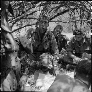 Phan Rang, Vietnam....First Lieutenant Tovar of the Recondos gives instructions to his squad leaders while on... - NARA - 531448 photo