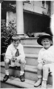 Photograph of Gerald R. Ford, Jr., and his Cousin Gardner James Sitting on the Steps of an Unidentified House - NARA - 186918 photo