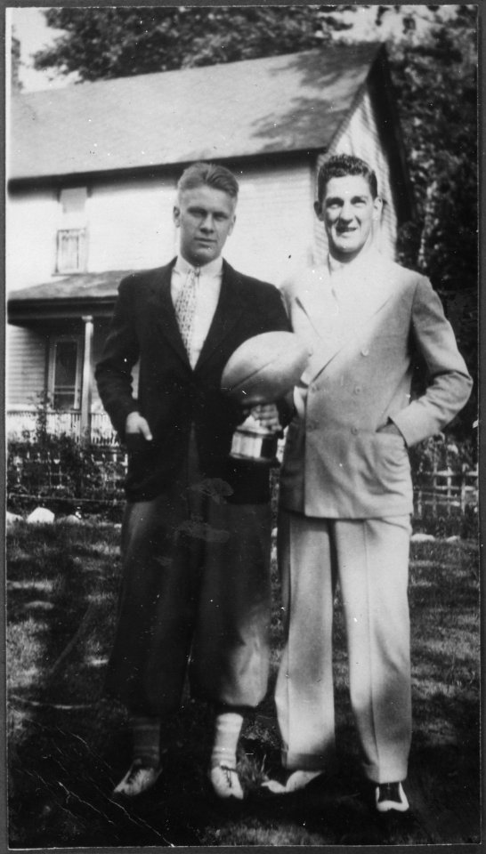 Photograph of Gerald R. Ford, Jr., Holding a Trophy with University of Michigan Football Teammate Herman Everhardus - NARA - 186983