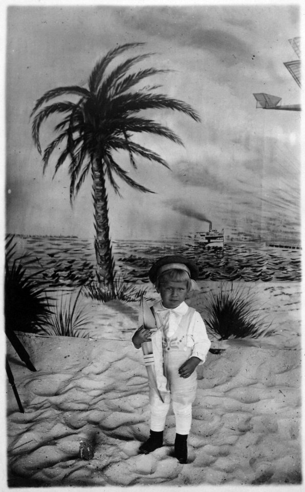 Photograph of Gerald R. Ford, Jr., (Then Leslie Lynch King, Jr.) Posing for a Portrait while Holding a Toy Boat - NARA - 186903