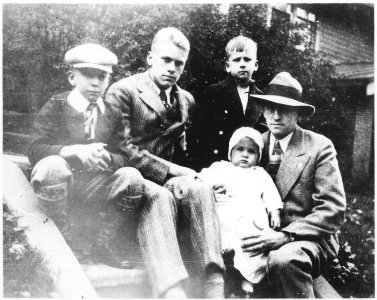 Photograph of Gerald R. Ford, Jr., with His Father and Half-Brothers Tom, Dick, and Jim, on the Front Steps of Their... - NARA - 186953 photo