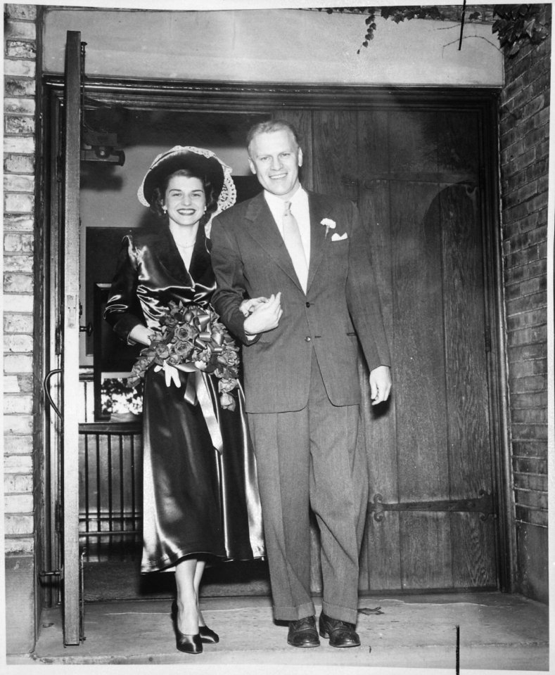 Photograph of Gerald R. Ford, Jr., and Betty Ford Walking Out of Grace Episcopal Church in Grand Rapids, Michigan... - NARA - 186888