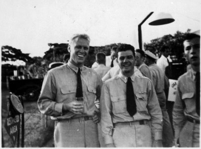 Photograph of Gerald R. Ford, Jr. and Lt. (Junior Grade) W. E. Delaney at the Farewell Party for Air Group at the... - NARA - 187039