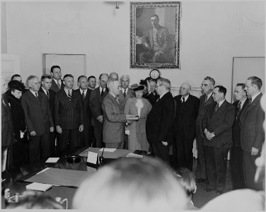 Photograph of Harry S. Truman taking the oath of office as President of the United States in the Cabinet Room of the... - NARA - 199062