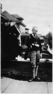 Photograph of Gerald R. Ford, Jr., in Golf Attire, in Front of His Home in Grand Rapids, Michigan - NARA - 187000 photo