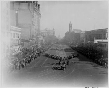 Photograph of Inaugural parade, with view of the Capitol in the distance. - NARA - 200068 photo