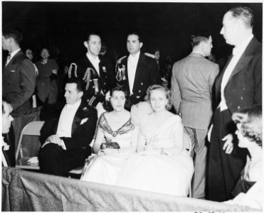 Photograph of Margaret Truman with others at the Inaugural Ball, held at the National Guard Armory in Washington. - NARA - 200072