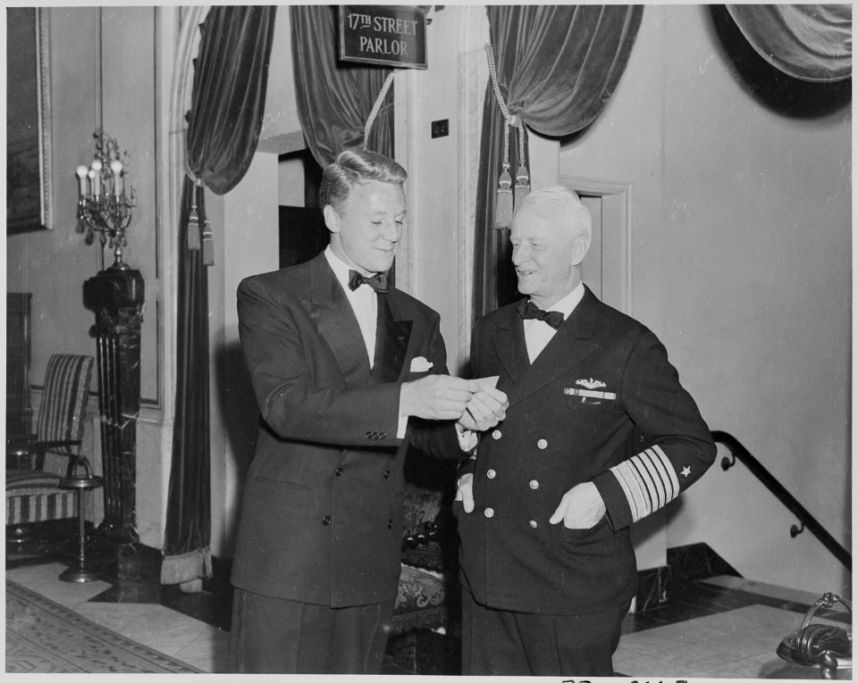 Photograph of movie star Van Johnson with Admiral Chester Nimitz. - NARA - 199322