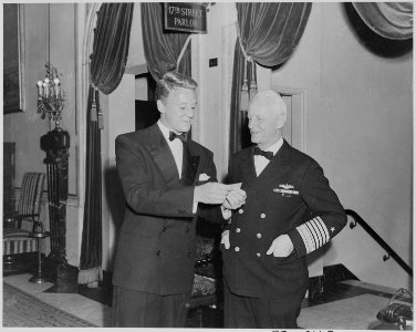 Photograph of movie star Van Johnson with Admiral Chester Nimitz. - NARA - 199322
