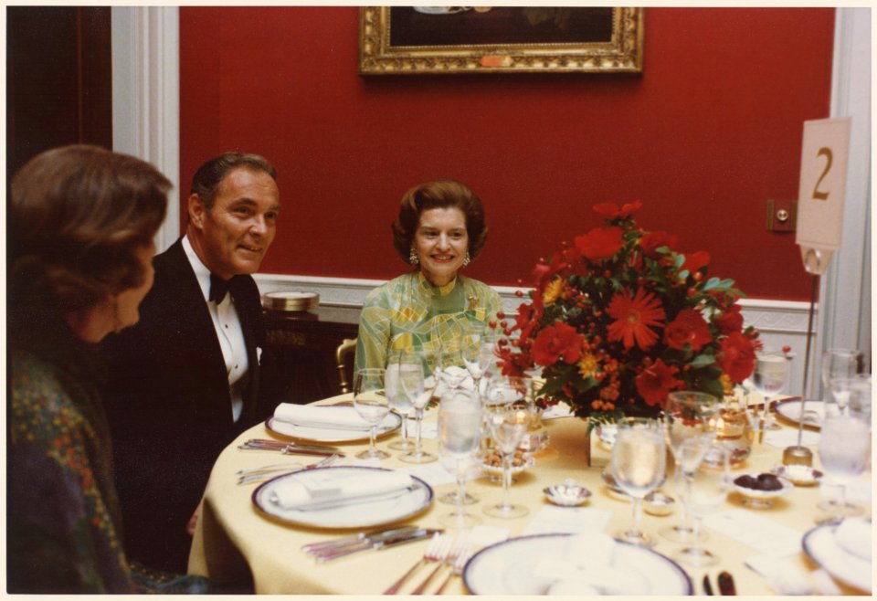Photograph of First Lady Betty Ford Dining with Alexander Haig and an Unidentified Woman in the Red Room of the White... - NARA - 186781